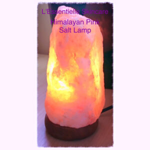 lit natural pink salt lamp